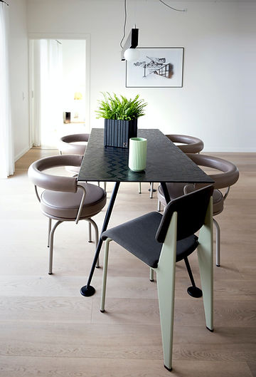 minimalist dining room with leather chairs