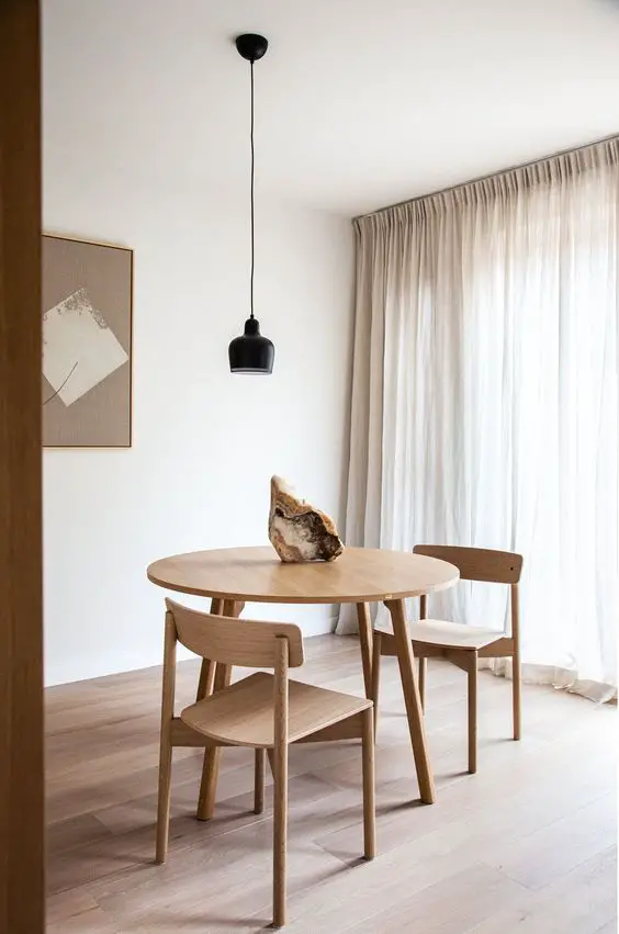 Flowy curtains in dining room